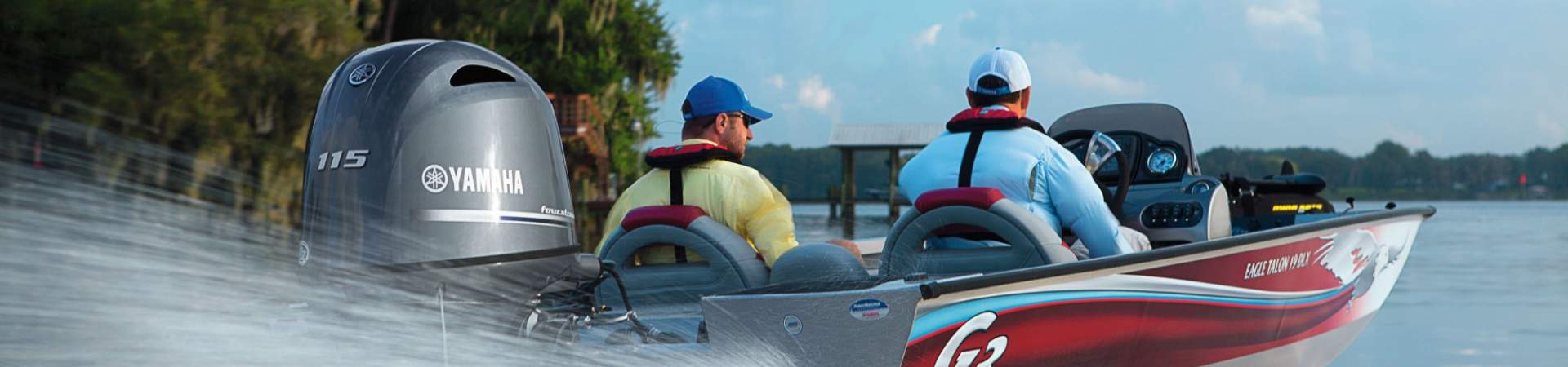 Two men in boat powered by Yamaha F115